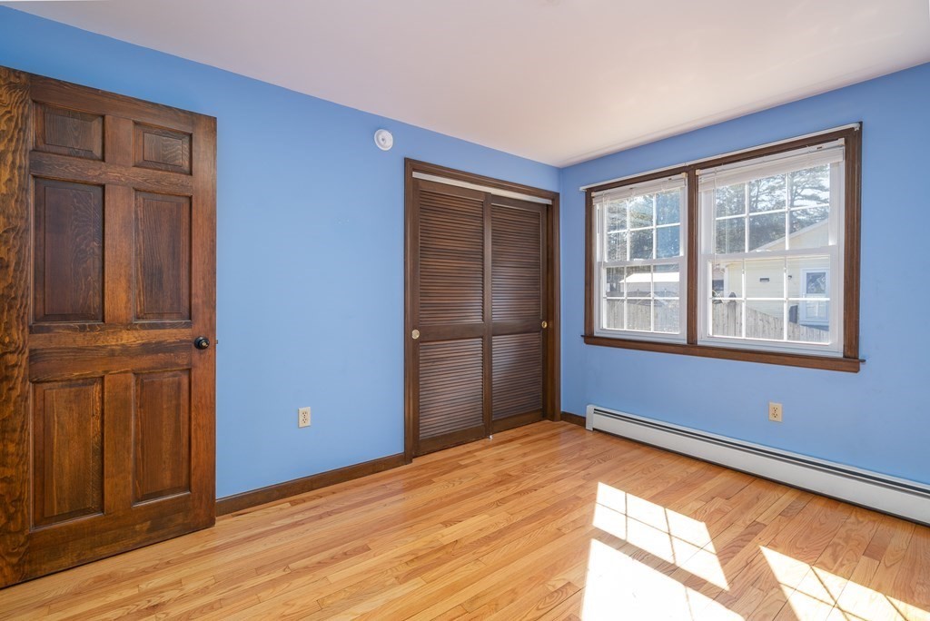 30 County Road Holyoke, MA 01040 - Photo 32 of 38 a view of empty room with window and wooden floor