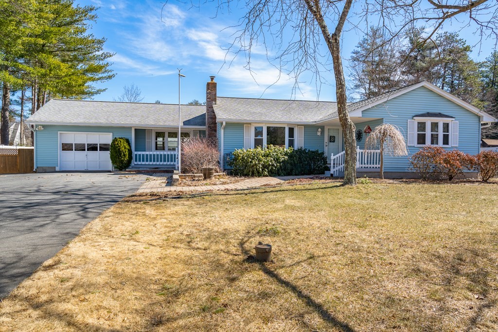30 County Road Holyoke, MA 01040 - Photo 7 of 38 a front view of a house with a yard