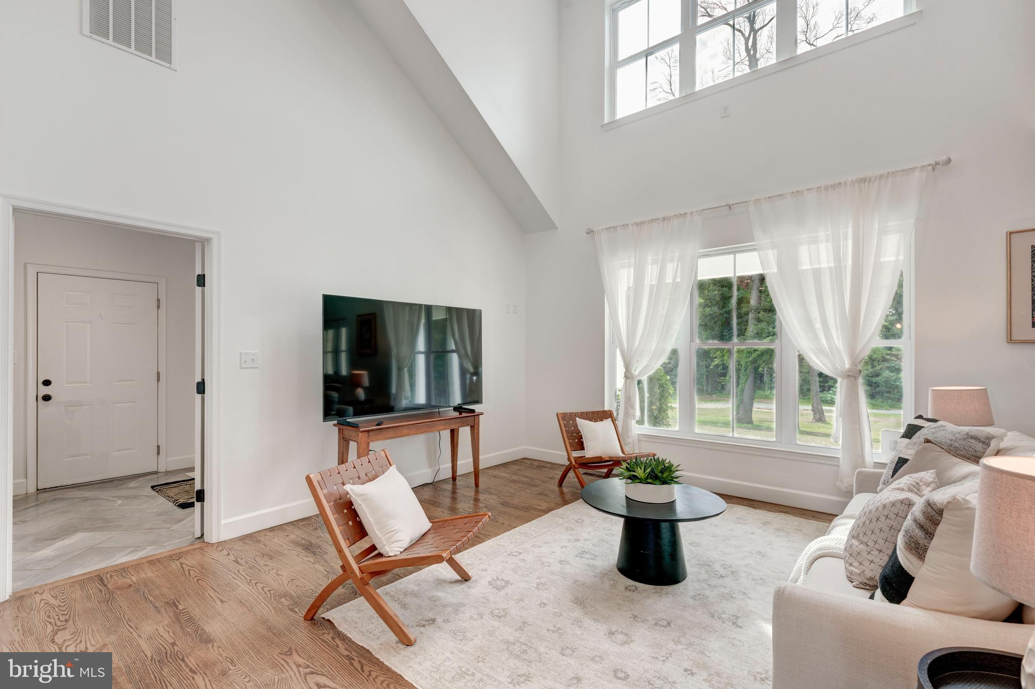 1865 Hughes Shop Road Westminster, MD 21158 - Photo 13 of 46 a living room with furniture and floor to ceiling windows