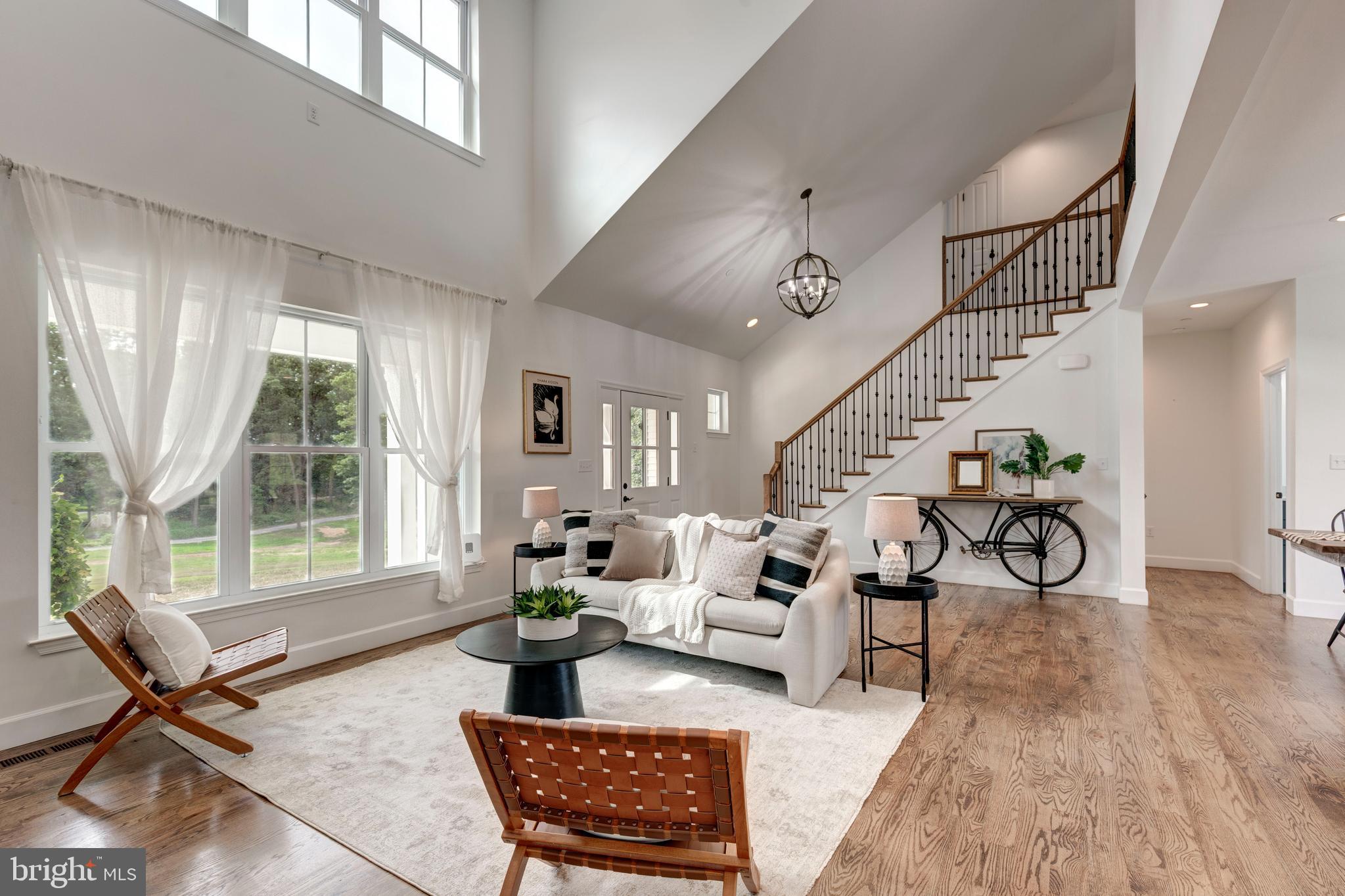 1865 Hughes Shop Road Westminster, MD 21158 - Photo 14 of 46 a living room with furniture a wooden floor and a large window