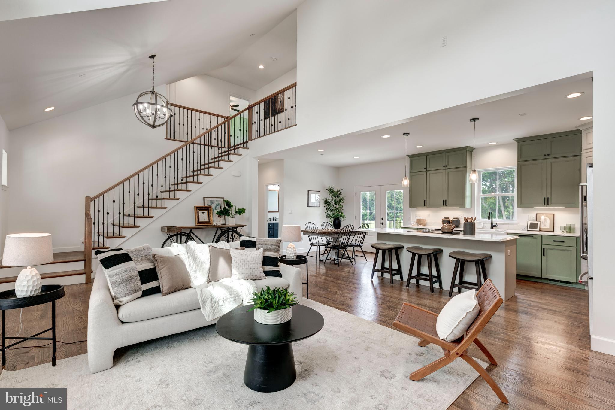 1865 Hughes Shop Road Westminster, MD 21158 - Photo 15 of 46 a living room with lots of furniture and a dining table with wooden floor