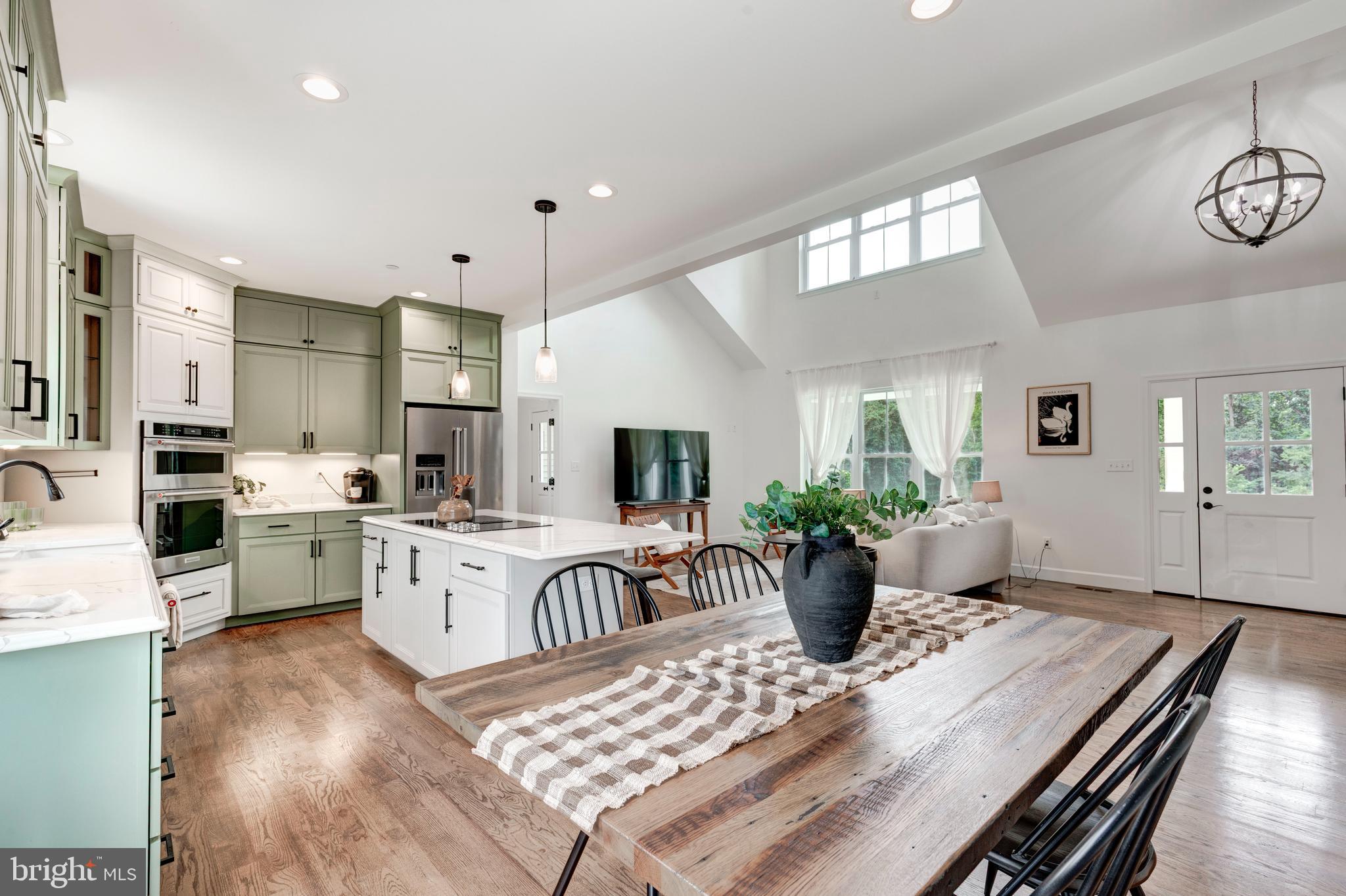 1865 Hughes Shop Road Westminster, MD 21158 - Photo 19 of 46 a kitchen with a table chairs and a dining table
