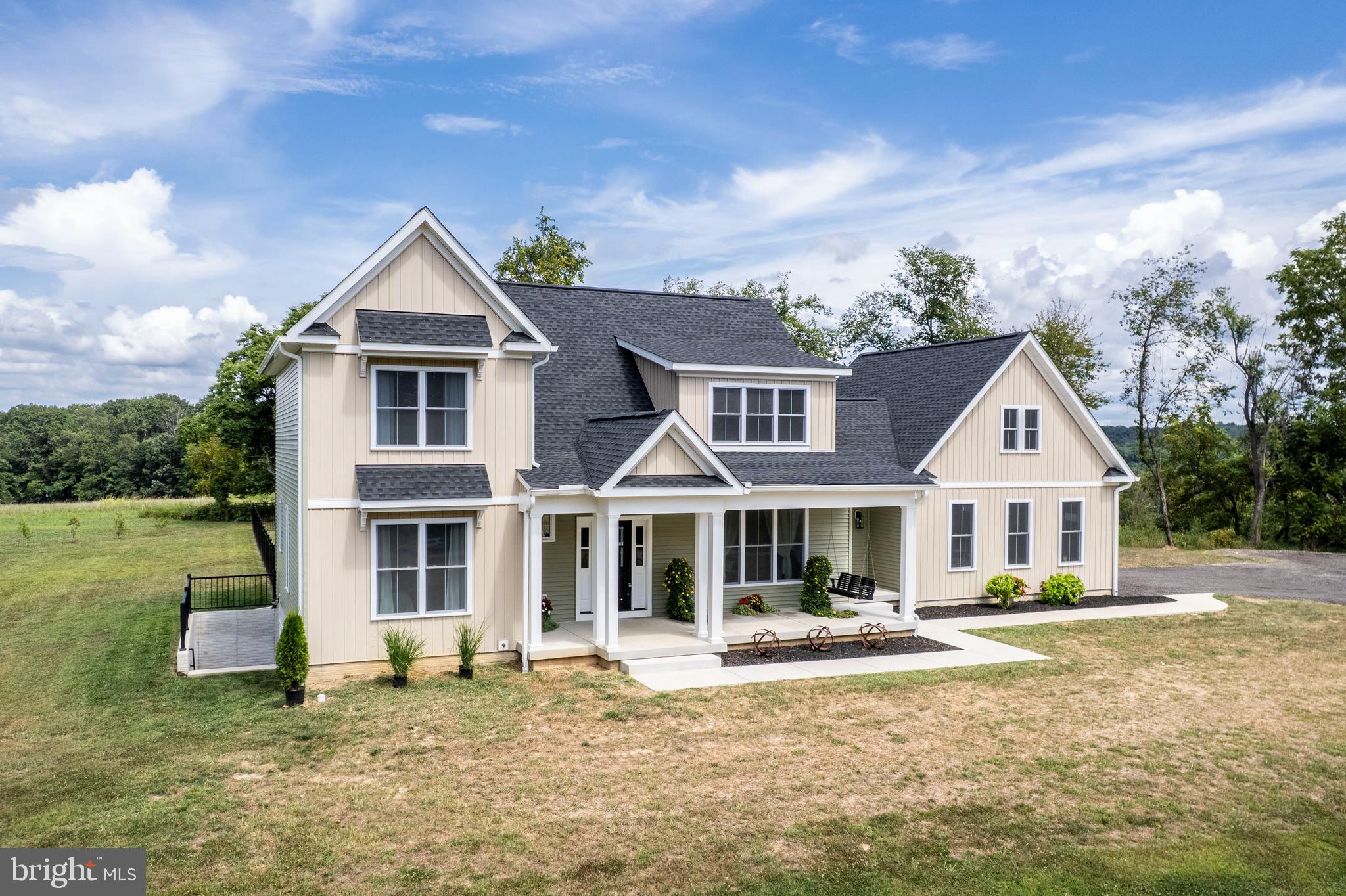 1865 Hughes Shop Road Westminster, MD 21158 - Photo 2 of 46 a front view of a house with a yard