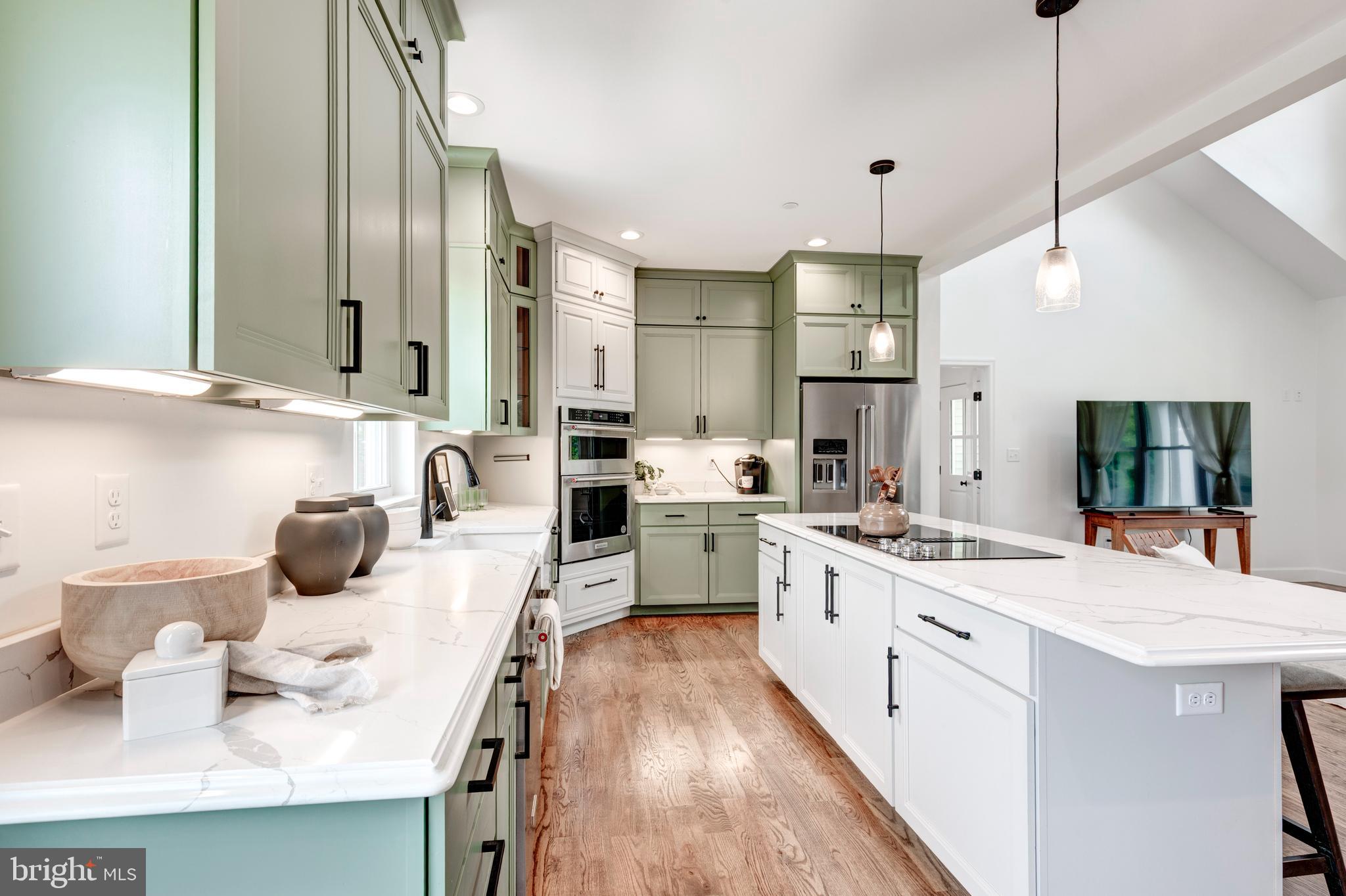 1865 Hughes Shop Road Westminster, MD 21158 - Photo 22 of 46 a kitchen with stove a sink and cabinets