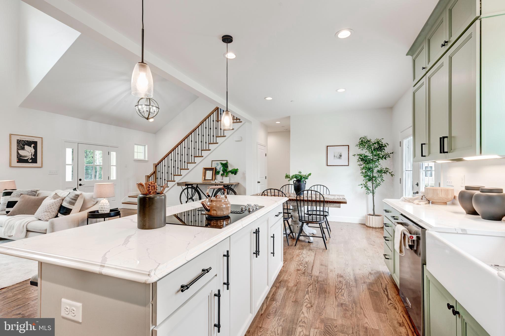 1865 Hughes Shop Road Westminster, MD 21158 - Photo 24 of 46 a kitchen with counter top space a sink stainless steel appliances and windows