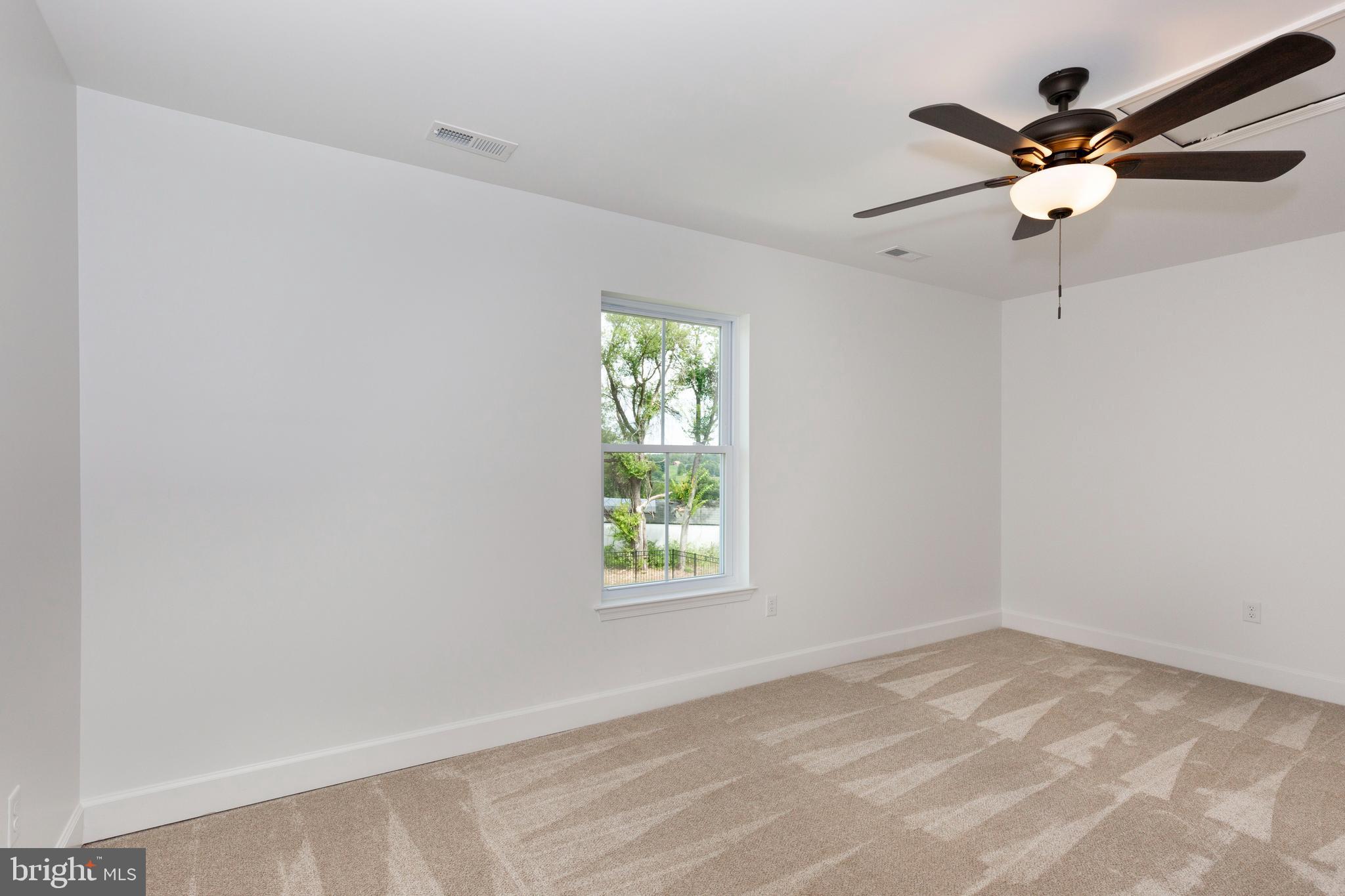 1865 Hughes Shop Road Westminster, MD 21158 - Photo 38 of 46 an empty room with windows and fan
