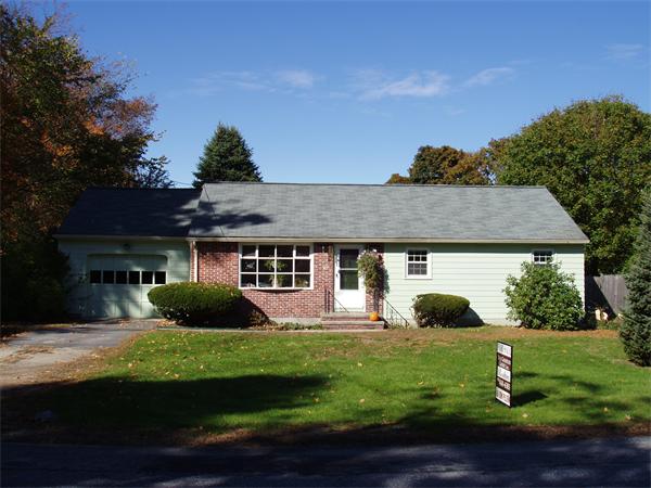 496 Harvard Road Lancaster, MA 01523 - Photo 1 of 12 a front view of a house with garden