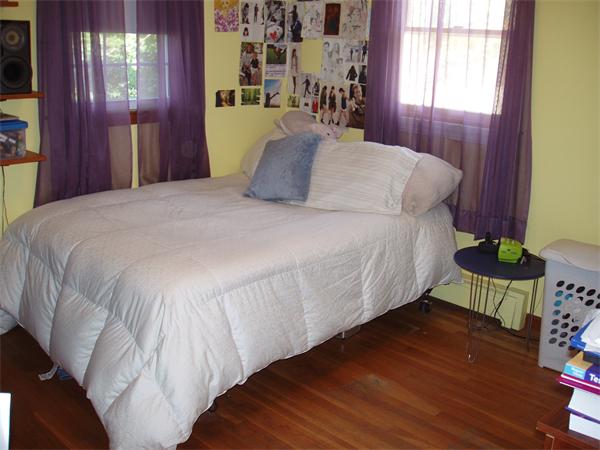 496 Harvard Road Lancaster, MA 01523 - Photo 12 of 12 a bedroom with a bed and a window