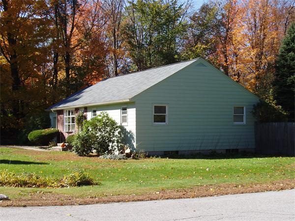 496 Harvard Road Lancaster, MA 01523 - Photo 2 of 12 a view of a house with a yard