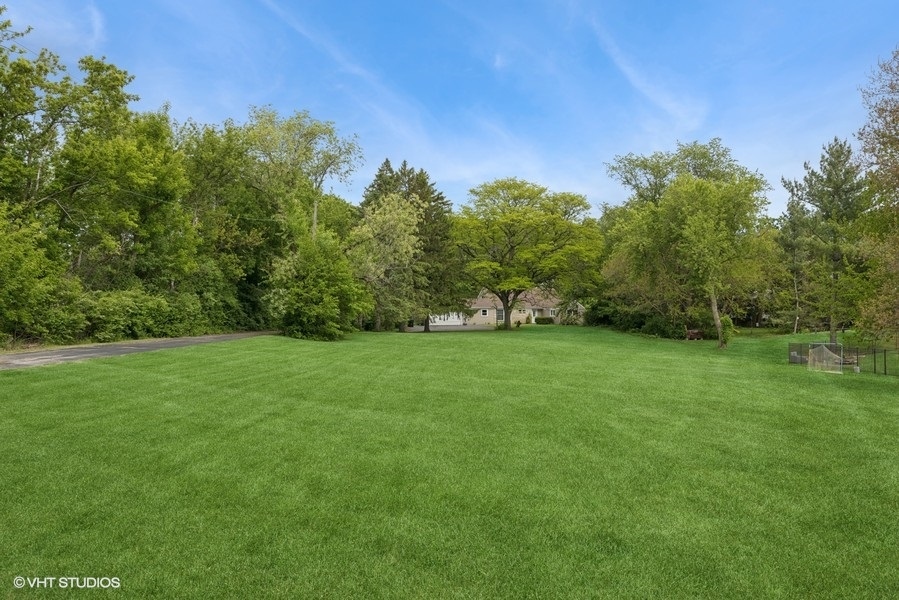 7102 Silver Lake Road Cary, IL 60013 - Photo 19 of 32 a view of a field of grass and trees