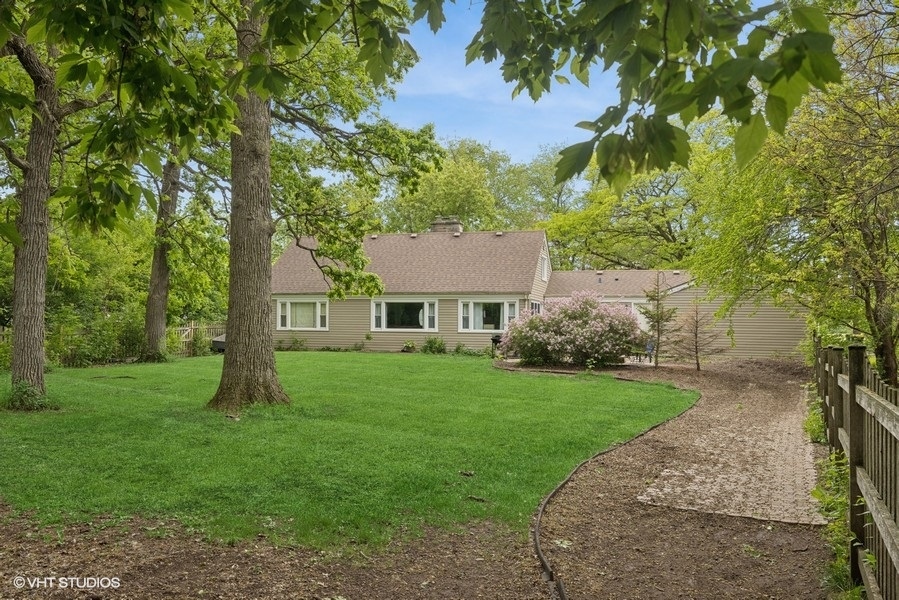 7102 Silver Lake Road Cary, IL 60013 - Photo 20 of 32 a view of a big yard next to a house