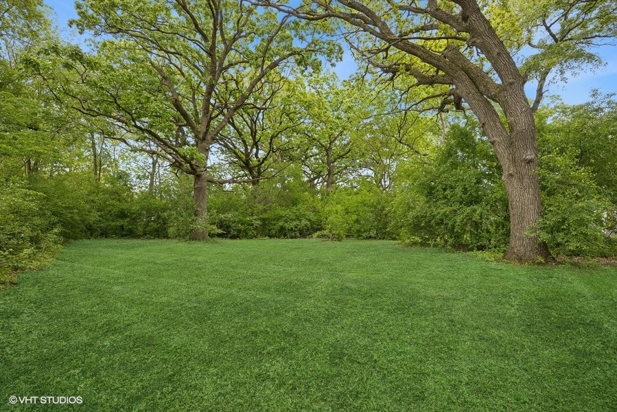7102 Silver Lake Road Cary, IL 60013 - Photo 24 of 32 a view of a grassy field with trees