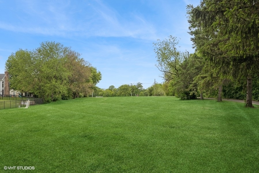 7102 Silver Lake Road Cary, IL 60013 - Photo 28 of 32 a view of a field with trees in the background