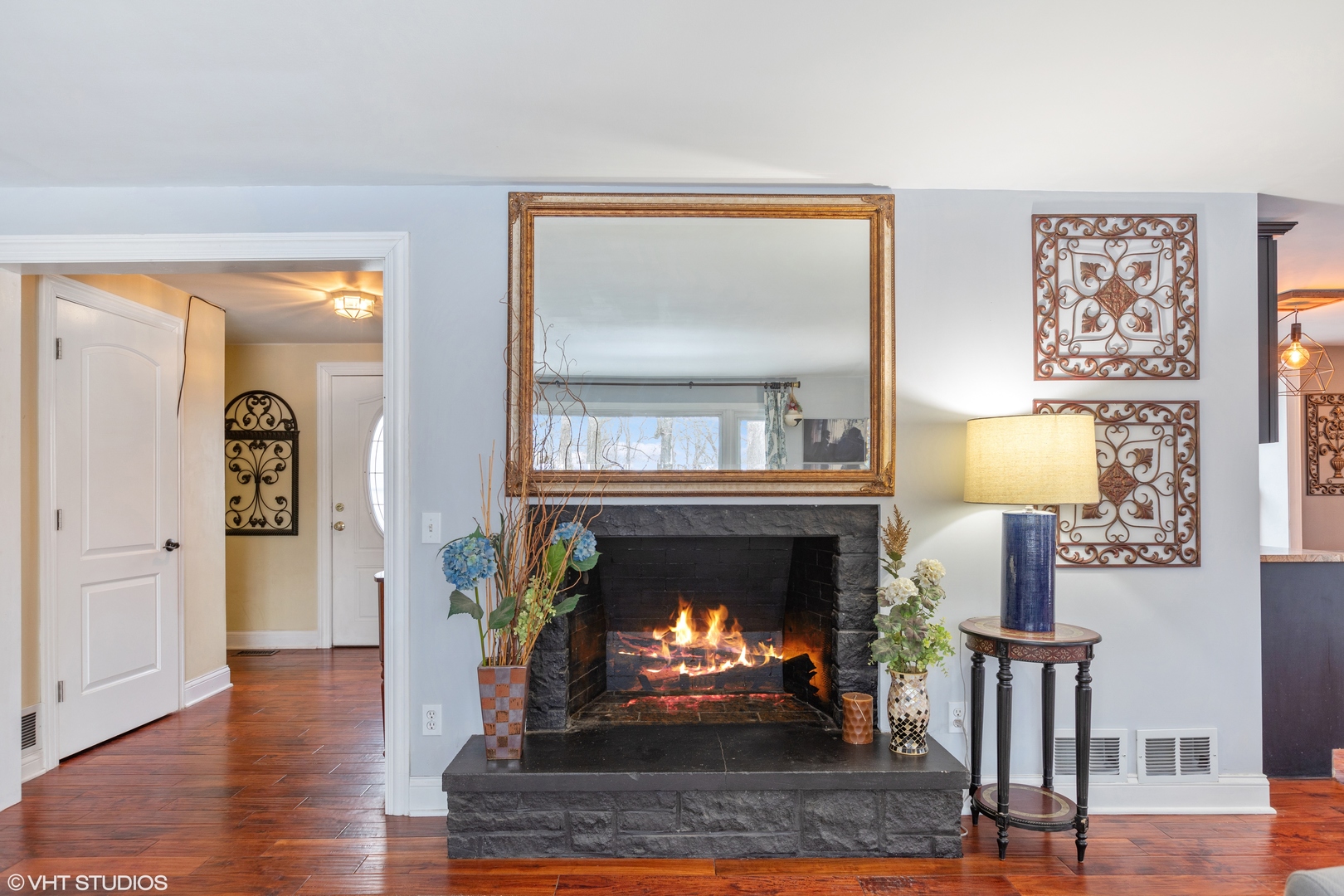 7102 Silver Lake Road Cary, IL 60013 - Photo 5 of 32 a living room with furniture and a fireplace