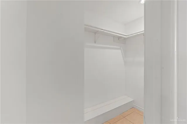 a bathroom with a sink and shower