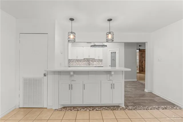 a view of a room with rack on the wall