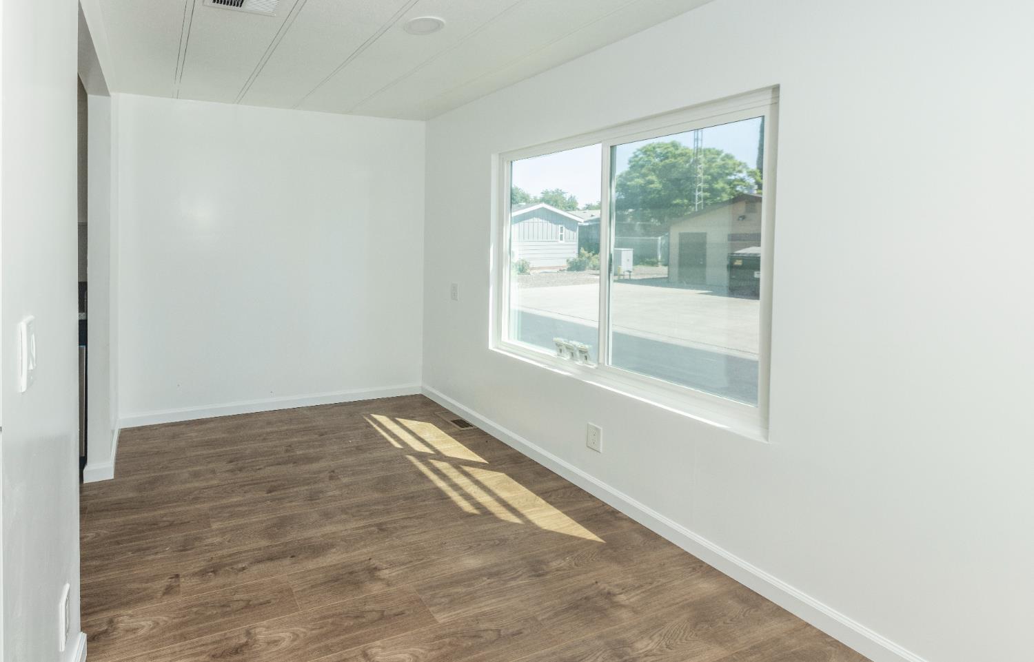 3901 Lake Road, Unit 151 West Sacramento, CA 95691 - Photo 9 of 18 a view of an empty room with a window