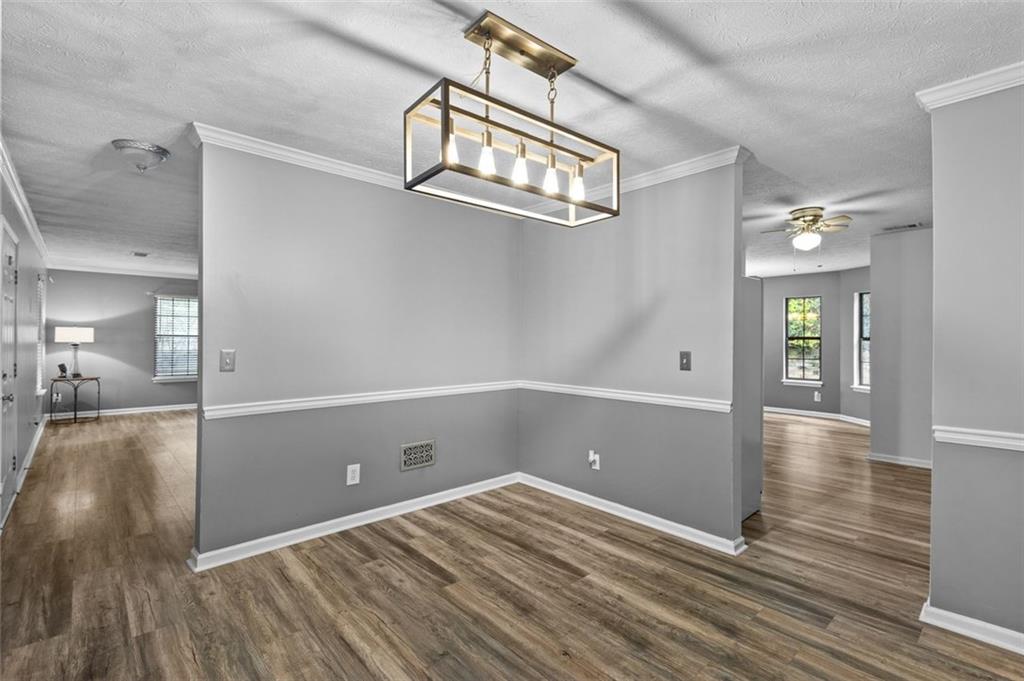 2888 Cardinal Trace Duluth, GA 30096 - Photo 12 of 51 wooden floor in an empty room with a window