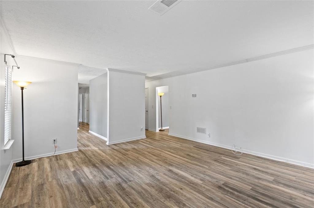 2888 Cardinal Trace Duluth, GA 30096 - Photo 23 of 51 a view of an empty room and wooden floor