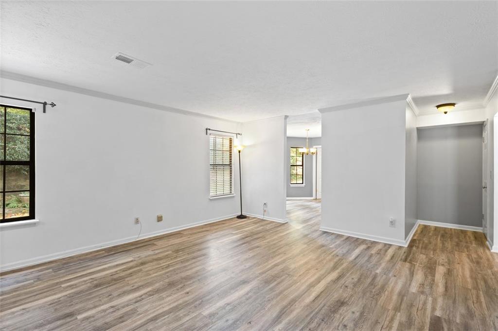 2888 Cardinal Trace Duluth, GA 30096 - Photo 24 of 51 a view of empty room with wooden floor and fan