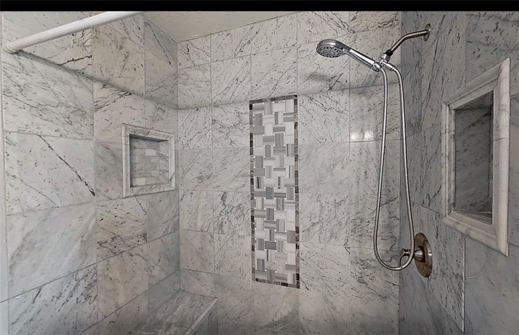 2888 Cardinal Trace Duluth, GA 30096 - Photo 28 of 51 a bathroom with a shower