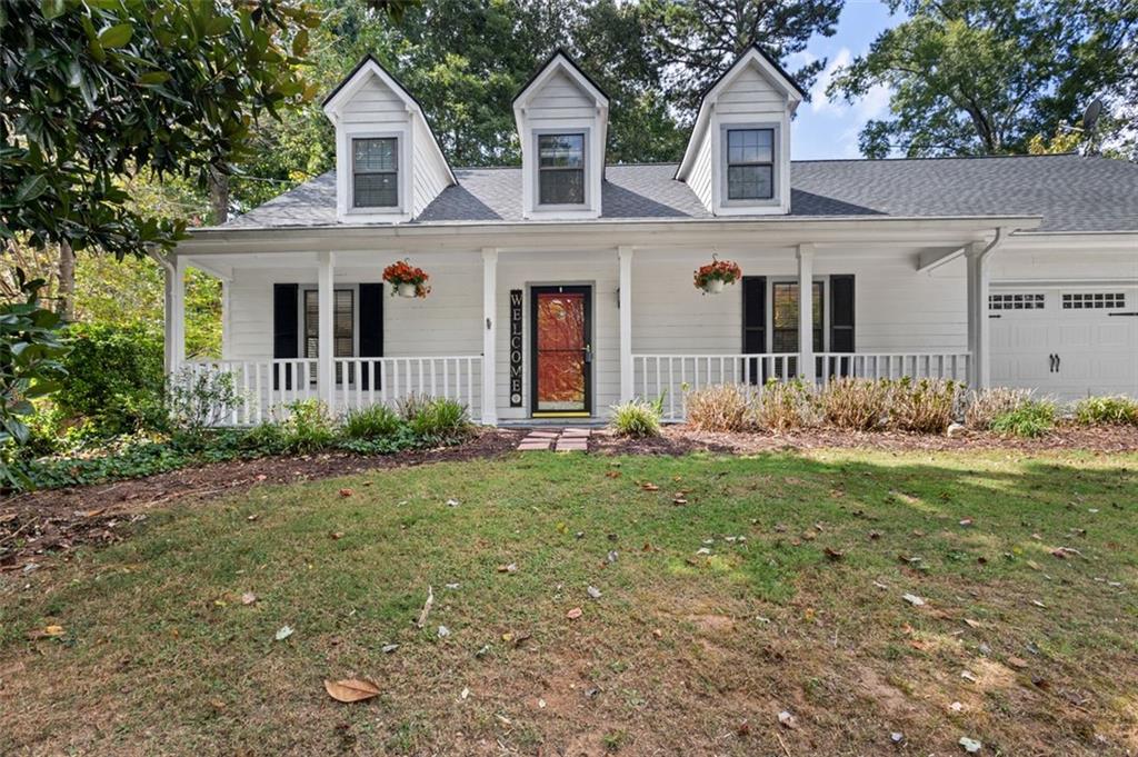 2888 Cardinal Trace Duluth, GA 30096 - Photo 3 of 51 a front view of a house with a yard
