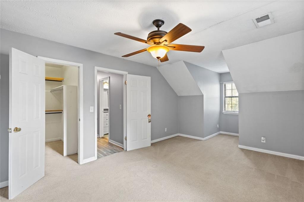 2888 Cardinal Trace Duluth, GA 30096 - Photo 33 of 51 a view of a livingroom with a ceiling fan and window