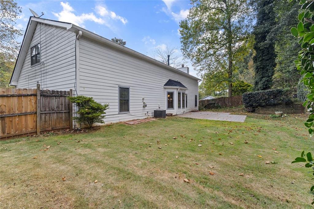 2888 Cardinal Trace Duluth, GA 30096 - Photo 36 of 51 a view of a house with backyard and sitting area