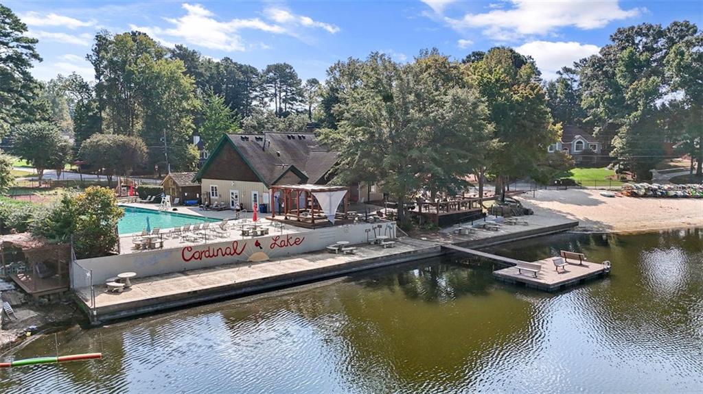 2888 Cardinal Trace Duluth, GA 30096 - Photo 38 of 51 a view of swimming pool with outdoor seating and trees in the background