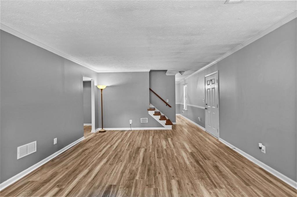 2888 Cardinal Trace Duluth, GA 30096 - Photo 8 of 51 a view of a room with wooden floor