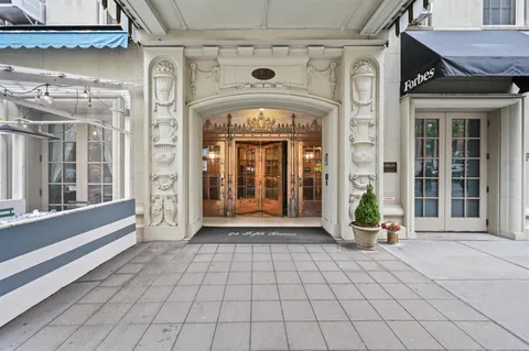 a view of a entryway door front of building