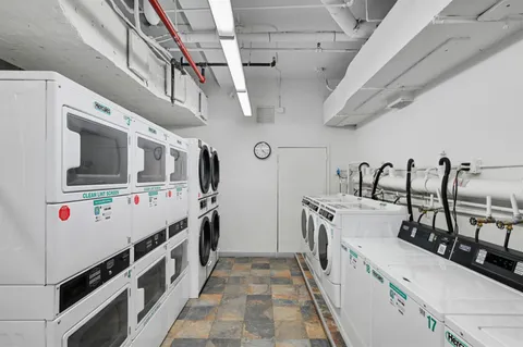 a view of a hallway with a glass door