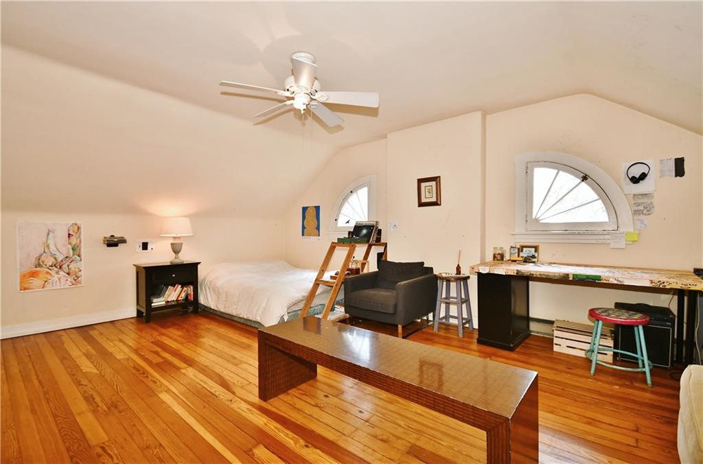 6623 Kinsman Road Pittsburgh, PA 15217 - Photo 15 of 25 a living room with furniture and a flat screen tv