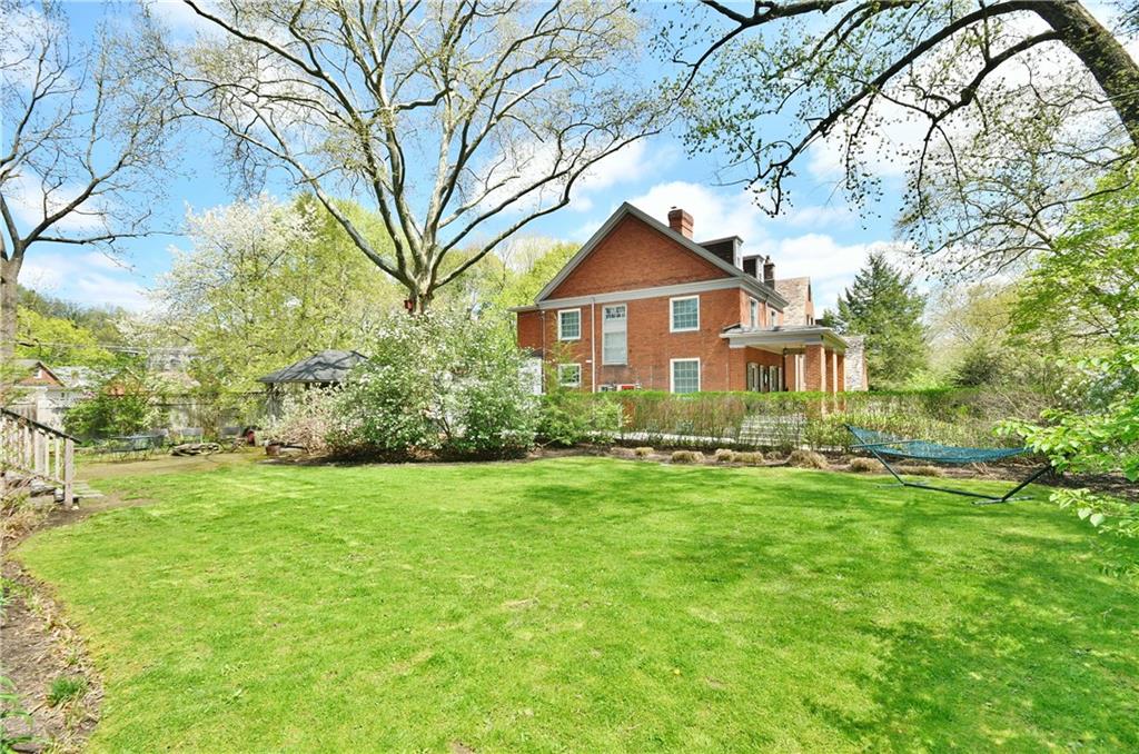 6623 Kinsman Road Pittsburgh, PA 15217 - Photo 25 of 25 a front view of a house with a yard