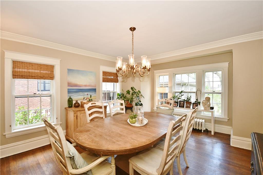 6623 Kinsman Road Pittsburgh, PA 15217 - Photo 8 of 25 a view of a dining room with furniture wooden floor and chandelier
