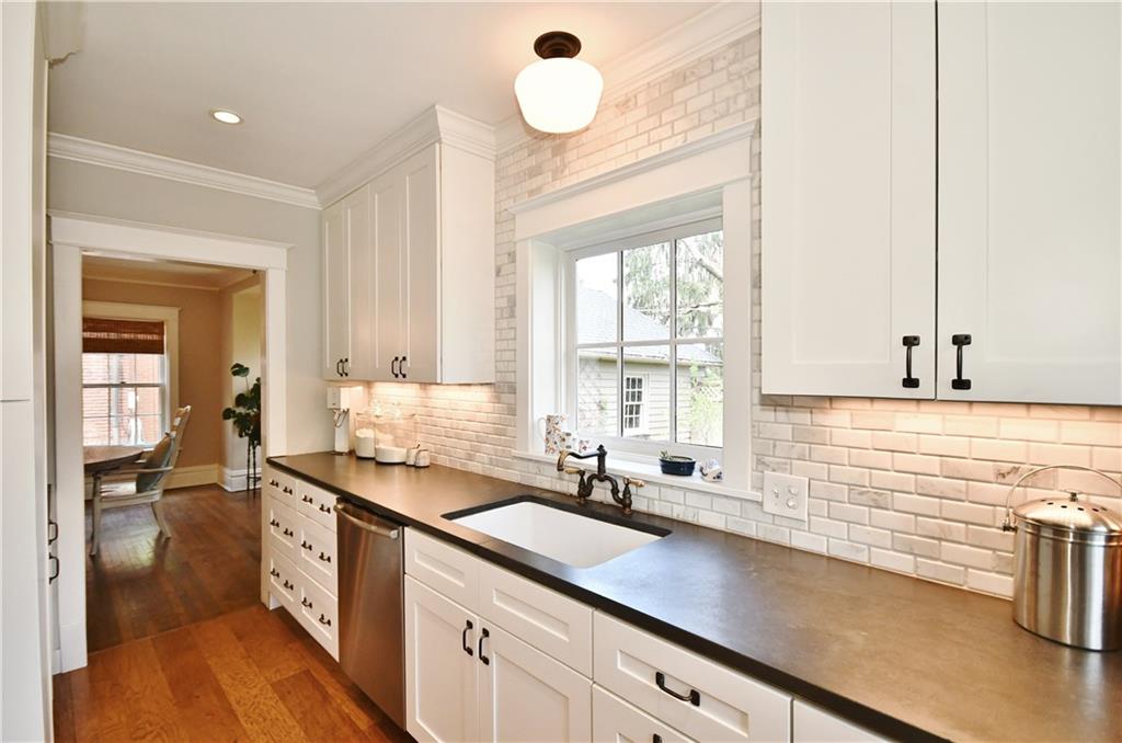 6623 Kinsman Road Pittsburgh, PA 15217 - Photo 10 of 25 a kitchen with a sink and a window