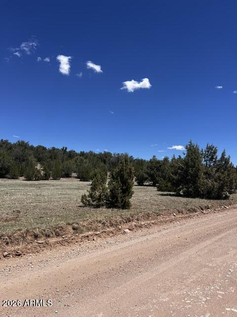 Lot 15 Juniper Mtn Ranches, Unit 15 Seligman, AZ 86337 - Photo 2 of 13 a view of a lake with sunset view