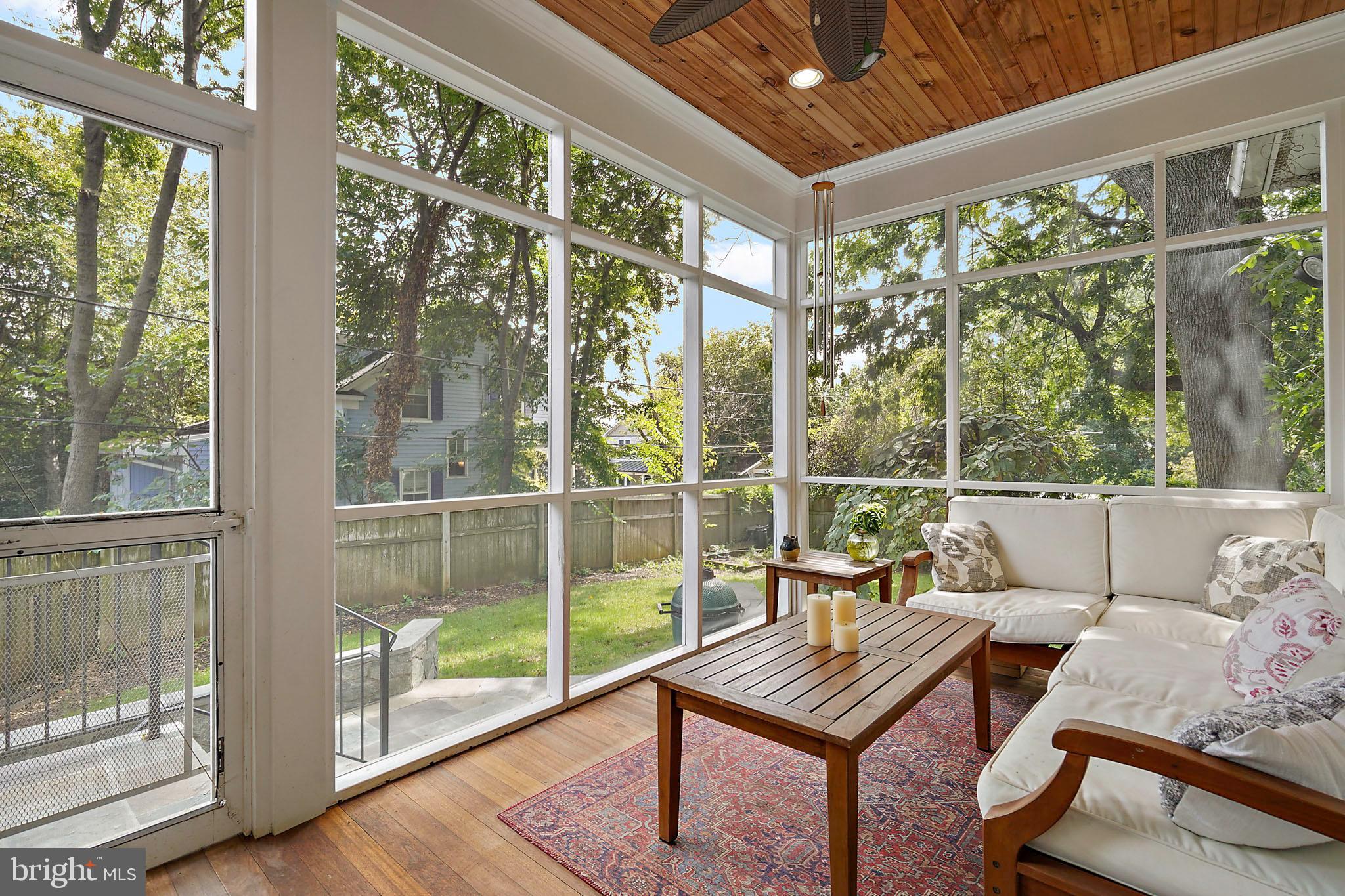 1503 Russell Road Alexandria, VA 22301 - Photo 11 of 31 a living room with large windows