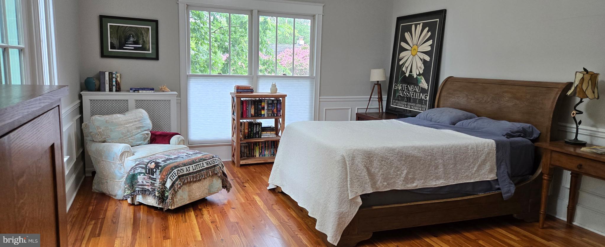 1503 Russell Road Alexandria, VA 22301 - Photo 12 of 31 a bedroom with a bed wooden floor and window
