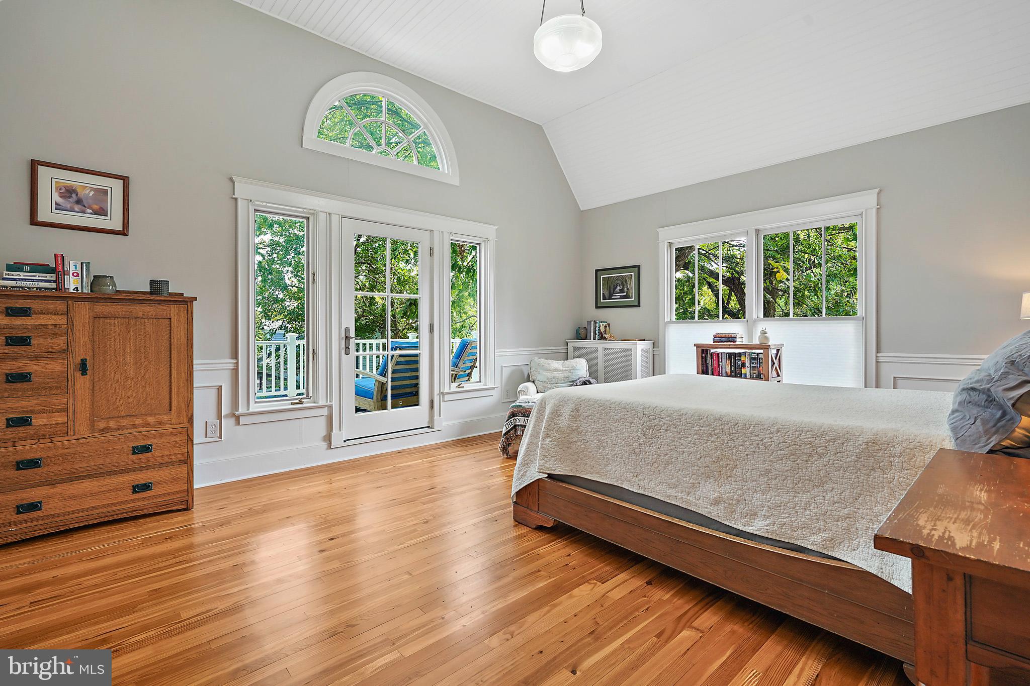 1503 Russell Road Alexandria, VA 22301 - Photo 13 of 31 a bed room with a bed and a large window