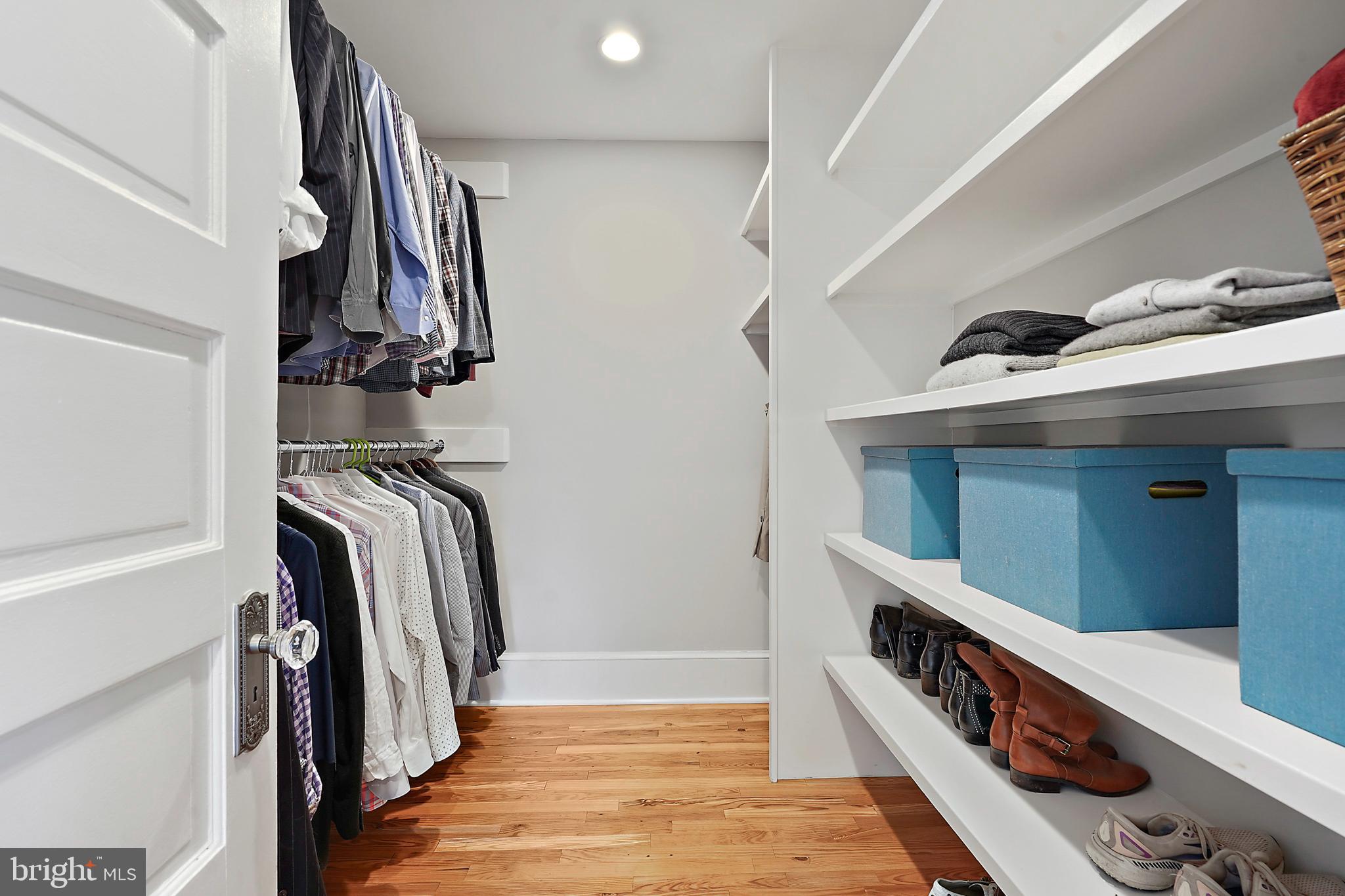 1503 Russell Road Alexandria, VA 22301 - Photo 15 of 31 a view of walk in closet with clothes and shoes