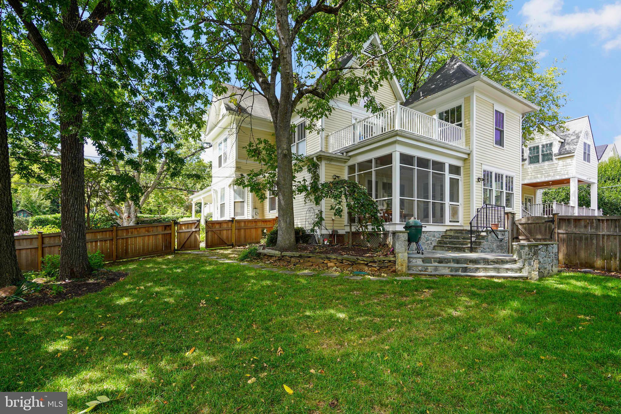 1503 Russell Road Alexandria, VA 22301 - Photo 30 of 31 a front view of a house with backyard and sitting area
