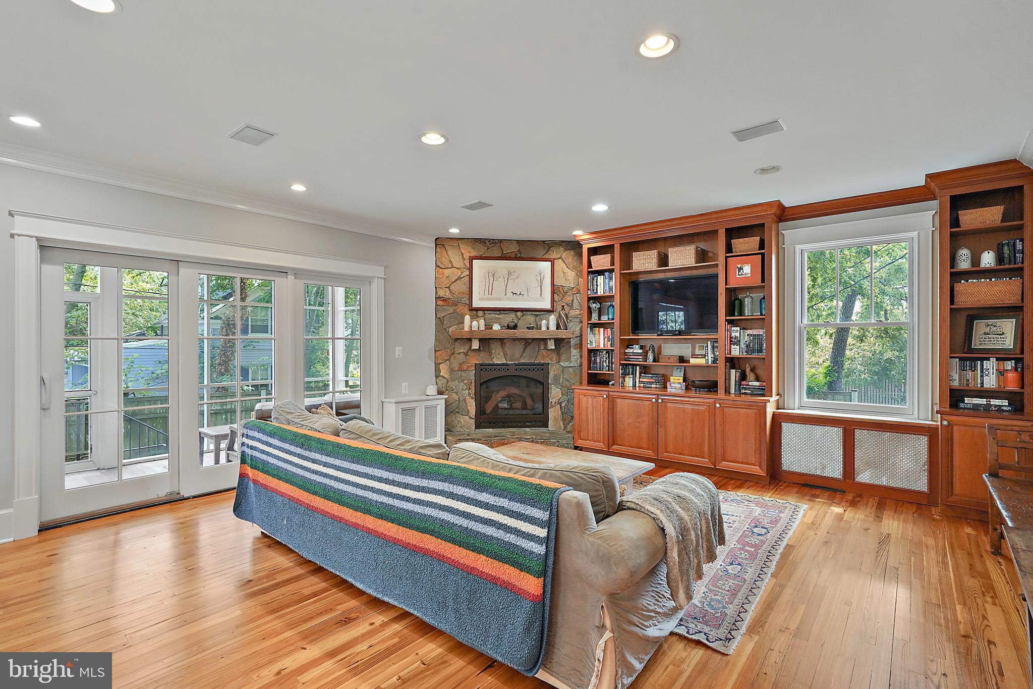 1503 Russell Road Alexandria, VA 22301 - Photo 10 of 31 a room with furniture and a fireplace