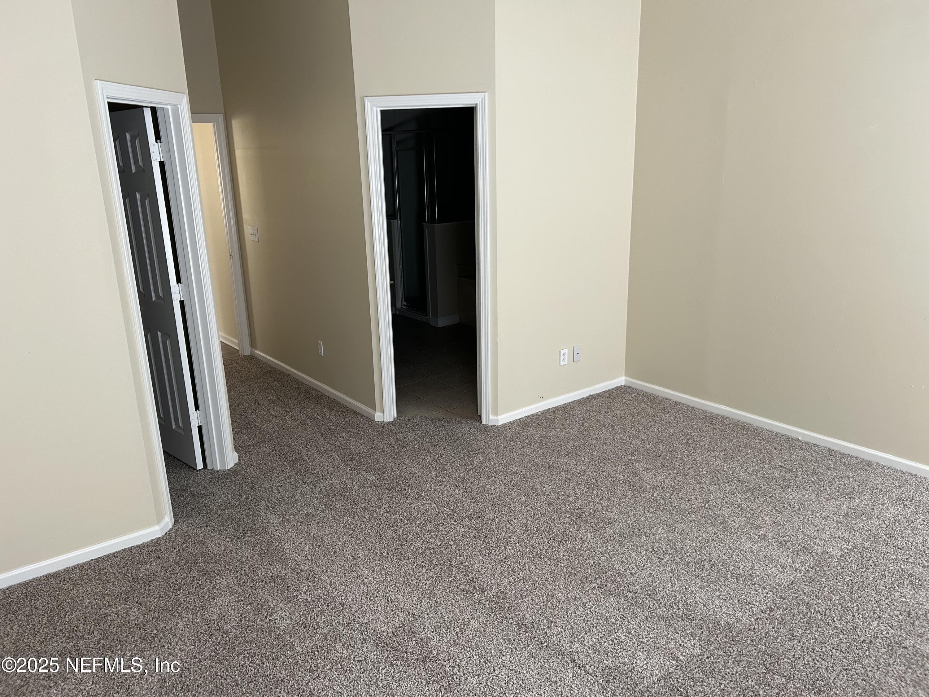 1425 Laurel Oak Drive Fleming Island, FL 32003 - Photo 15 of 25 an empty room with windows