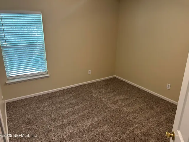 an empty room with a workbench