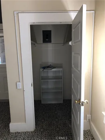 a view of storage and utility room