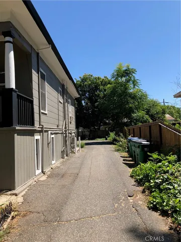 a backyard of a house with lots of green space