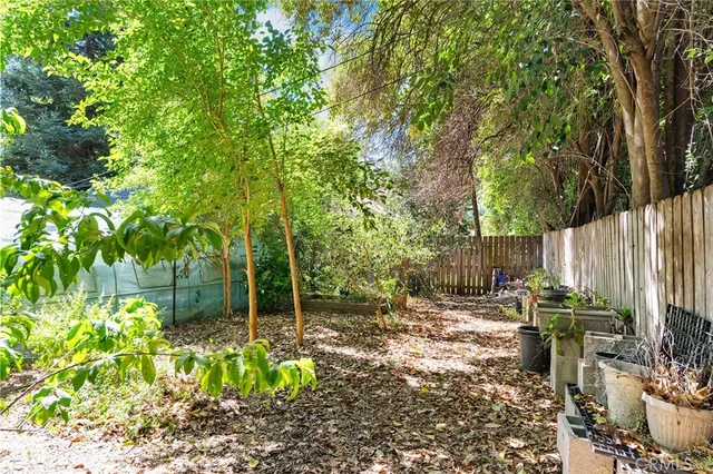 a view of yard with patio