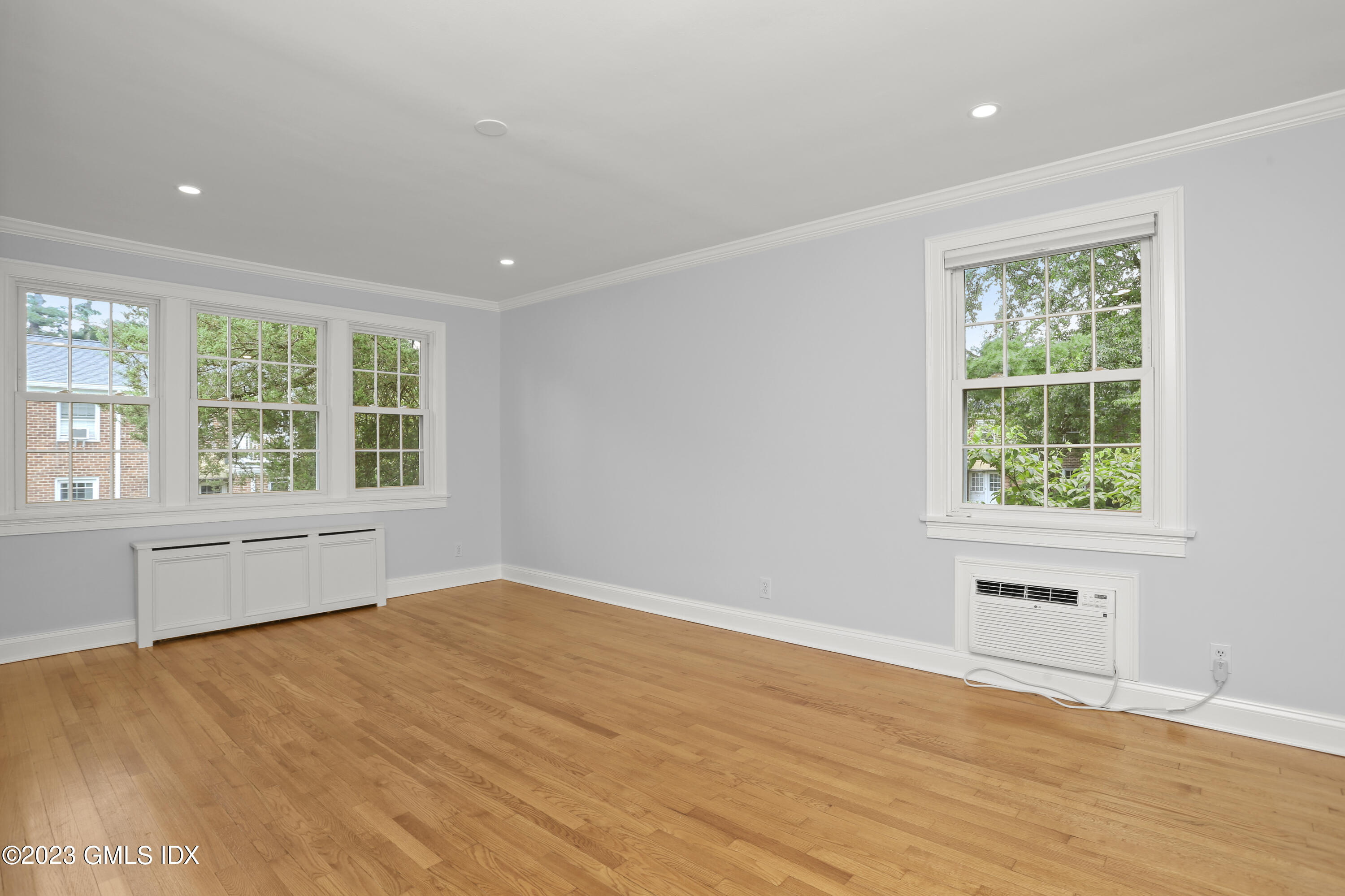 149 Putnam Park, Unit 149 Greenwich, CT 06830 - Photo 18 of 43 a view of an empty room with a window