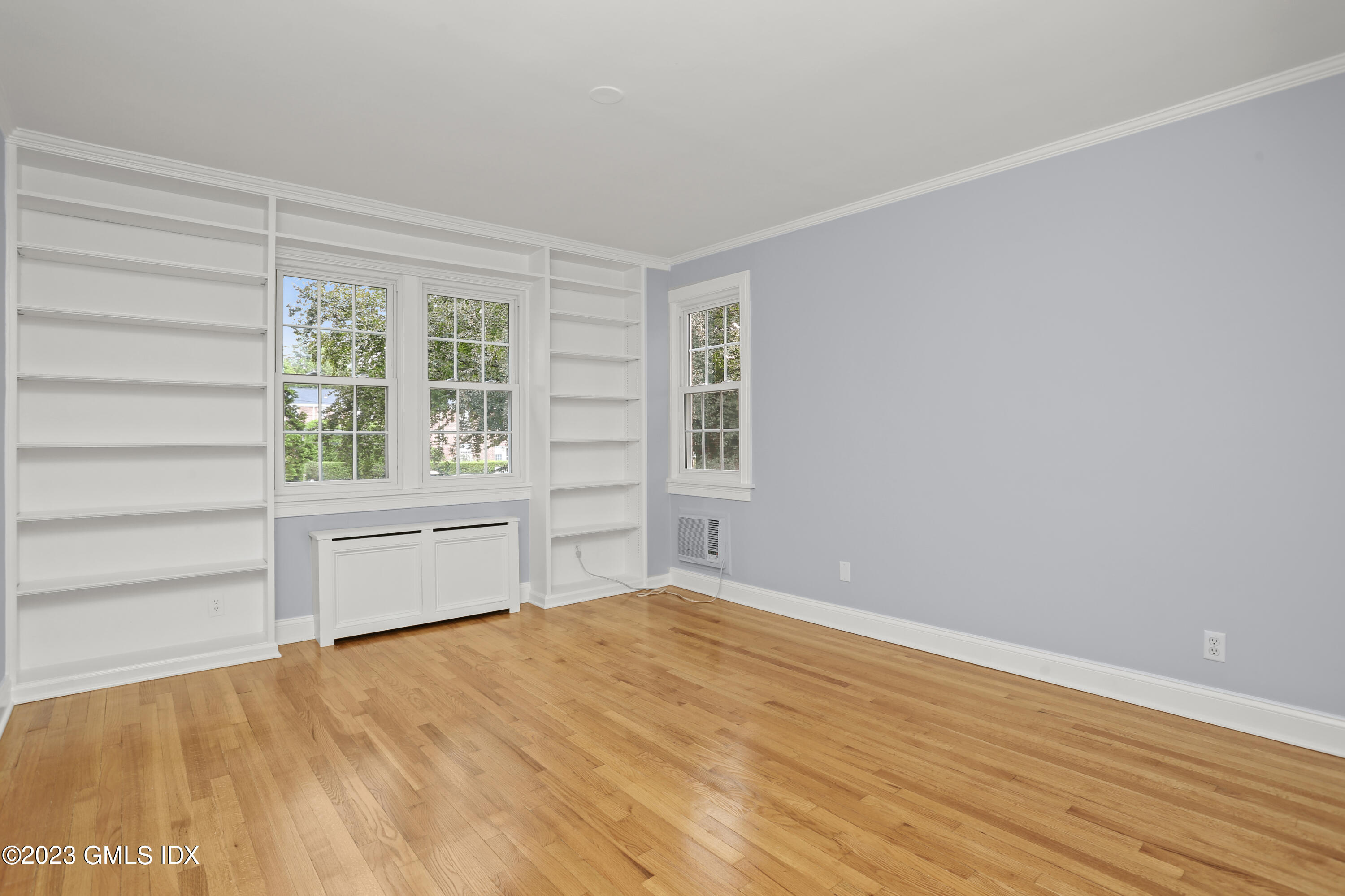 149 Putnam Park, Unit 149 Greenwich, CT 06830 - Photo 22 of 43 a view of an empty room with a window
